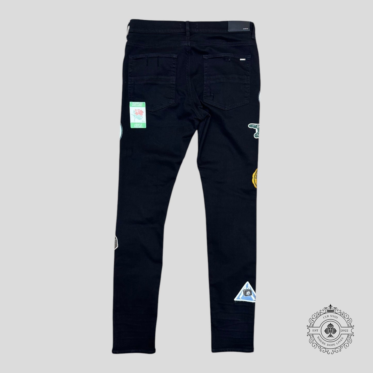 Amiri Travel Patch Repair Jeans in Black