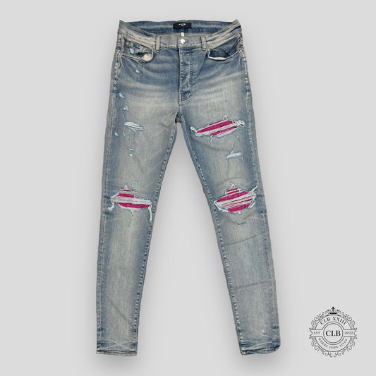 AMIRI MX1 CRACKED PAINT JEANS - CLAY INDIGO/PINK